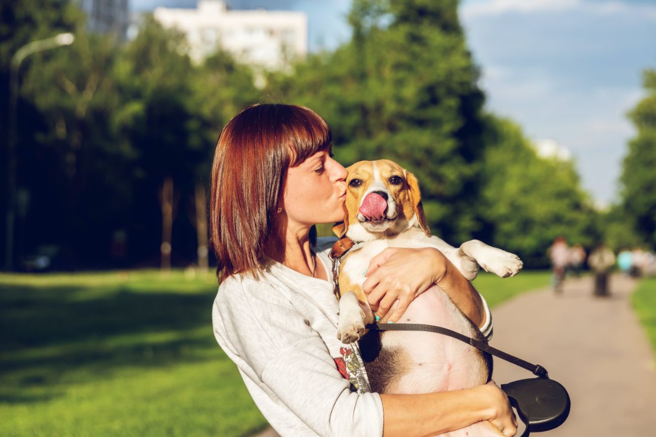 Woman Holding Dog